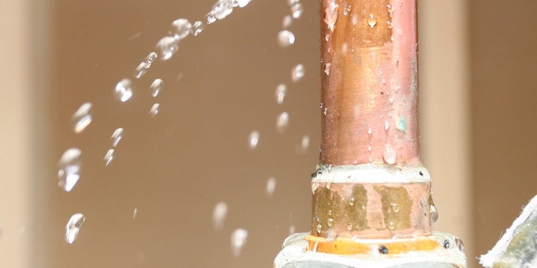 2 Plumber inspecting hidden water leak in Lakewood & Denver, CO