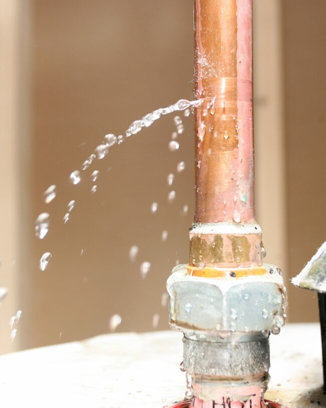 2 Plumber inspecting hidden water leak in Lakewood & Denver, CO