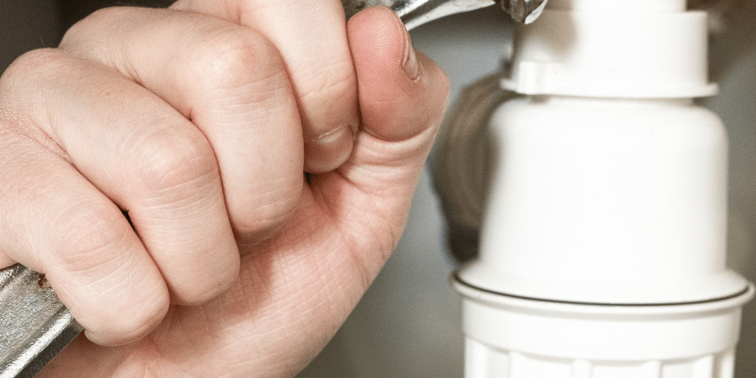 Defense Plumbing repairing a frozen pipe leak in Lakewood, CO.