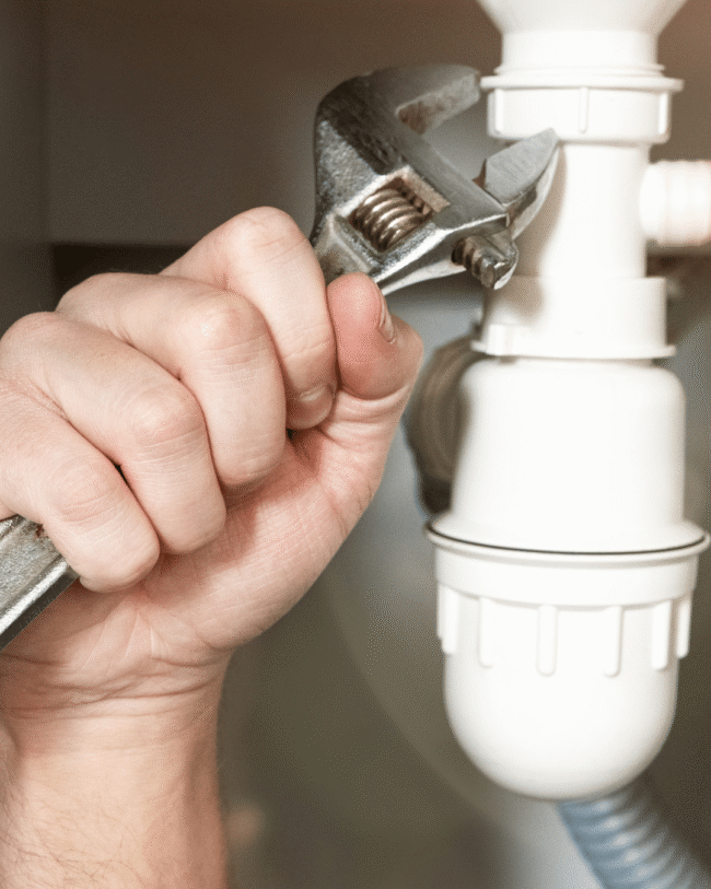 Defense Plumbing repairing a frozen pipe leak in Lakewood, CO.